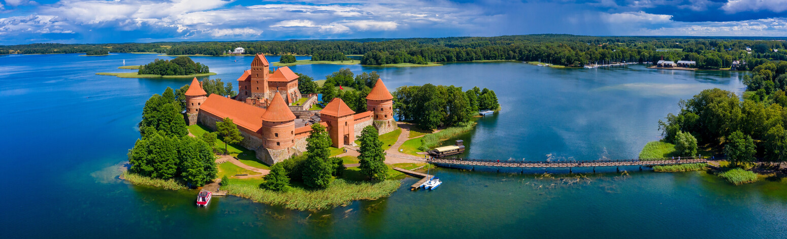 Aerial view of Trakai, over medieval gothic Island castle in Galve lake. Flat lay of the most beautiful Lithuanian landmark. Trakai Island Castle, most popular tourist destination in Lithuania